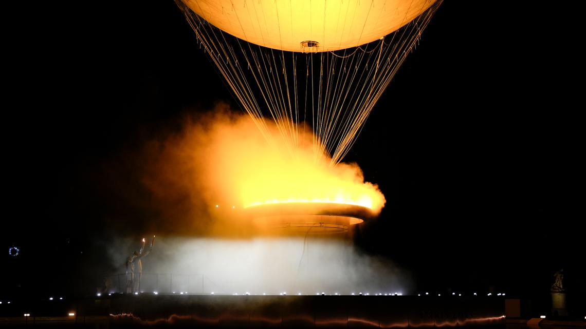 Paris Lights Up: A Hot Air Balloon Cauldron & a Touch of History