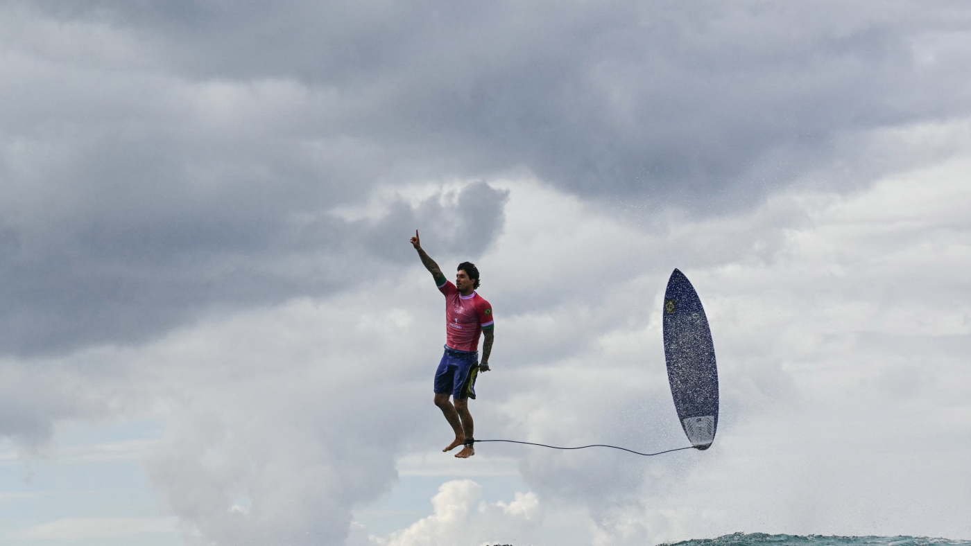 Olympic Surfing Photo Goes Viral: A Perfect Moment Captured